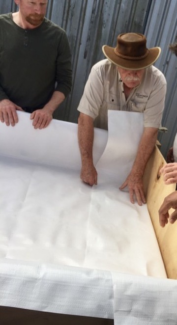 Hands-on liner installation during aquaponics training